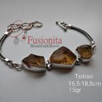 Kolme toortsitriiniga hõbekäekett